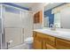 Clean bathroom with updated vanity and walk-in shower at 10318 W Desert Forest Cir, Sun City, AZ 85351
