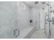 Spa-like bathroom with a large walk-in shower and built-in bench at 12651 S 71St St, Tempe, AZ 85287