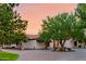 White stucco house with a terracotta roof and beautiful landscaping at 12651 S 71St St, Tempe, AZ 85287