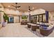 Relaxing outdoor patio with seating area and a large TV at 12651 S 71St St, Tempe, AZ 85287