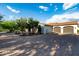 Luxury home with attached garage and paved driveway at 12651 S 71St St, Tempe, AZ 85287