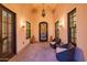 Inviting entryway with comfortable seating and beautiful lighting at 12651 S 71St St, Tempe, AZ 85287