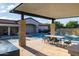 Inviting pool and patio area with covered dining space at 12651 S 71St St, Tempe, AZ 85287