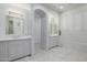 Elegant bathroom with double vanity, marble floors, and ample storage at 12651 S 71St St, Tempe, AZ 85287