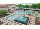 Large pool and spa with outdoor kitchen and seating at 12651 S 71St St, Tempe, AZ 85287