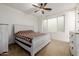 Serene bedroom with large window and a dresser at 12651 S 71St St, Tempe, AZ 85287