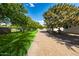 Landscaped yard with a brick pathway leading to the home's entrance at 12651 S 71St St, Tempe, AZ 85287