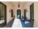 Bright and airy entryway with a chandelier and seating area at 12651 S 71St St, Tempe, AZ 85287