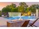 Inviting pool area with fire pit and lounge chairs at 12651 S 71St St, Tempe, AZ 85287