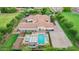 Aerial view of the house, pool and surrounding landscape at 12651 S 71St St, Tempe, AZ 85287