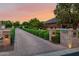 Landscaped driveway with brick pavers and lighting at 12651 S 71St St, Tempe, AZ 85287