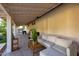 Covered patio with comfortable seating and a stone floor at 12651 S 71St St, Tempe, AZ 85287