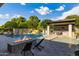 Relaxing pool area with fire pit and lounge chairs at 12651 S 71St St, Tempe, AZ 85287