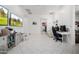 Playroom with two workspaces and views into other rooms at 12651 S 71St St, Tempe, AZ 85287