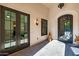 Sunlit entryway with French doors and a view of the backyard at 12651 S 71St St, Tempe, AZ 85287