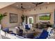 Spacious outdoor living area with comfortable seating and a large TV at 12651 S 71St St, Tempe, AZ 85287