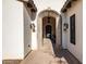 Impressive entryway with a large arched doorway and stone accents at 12651 S 71St St, Tempe, AZ 85287