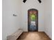Welcoming entryway with a bench and elegant door at 12651 S 71St St, Tempe, AZ 85287