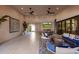 Spacious outdoor living area with comfortable seating and a large TV at 12651 S 71St St, Tempe, AZ 85287