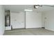 Clean and bright garage interior with laundry hookups at 19591 W Lincoln St, Buckeye, AZ 85326