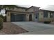 Two-story house with attached garage and landscaping at 19591 W Lincoln St, Buckeye, AZ 85326