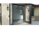 Bright workshop with garage door access and neutral colored flooring at 19591 W Lincoln St, Buckeye, AZ 85326