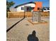 Modern home with a landscaped front yard, featuring a gravel driveway and unique rock retaining walls at 2002 W Adams St, Phoenix, AZ 85009