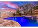 Enjoy this expansive pool and spa, complete with a mural backdrop at 27715 N 164Th Pl, Scottsdale, AZ 85262