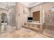 Luxurious bathroom with a large soaking tub, separate shower, and stylish tile at 27715 N 164Th Pl, Scottsdale, AZ 85262