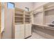 Large walk-in closet with ample shelving and hanging space at 27715 N 164Th Pl, Scottsdale, AZ 85262