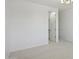 Bright bedroom with an adjacent closet and neutral walls at 19591 W Lincoln St, Buckeye, AZ 85326