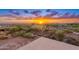 Aerial view showcases a beautiful community with upscale homes and desert landscape at 3518 N Shadow Trl, Mesa, AZ 85207