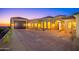 Luxury home exterior with stone accents and a large garage at 3518 N Shadow Trl, Mesa, AZ 85207