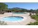 Community pool and spa with mountain views at 3518 N Shadow Trl, Mesa, AZ 85207