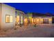 Luxury home's exterior boasts stone accents and desert landscaping at 3518 N Shadow Trl, Mesa, AZ 85207