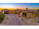Stunning desert contemporary home with stone accents and a paved driveway at 3518 N Shadow Trl, Mesa, AZ 85207