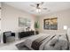 Spacious bedroom with large window and ceiling fan at 3518 N Shadow Trl, Mesa, AZ 85207
