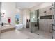 Elegant bathroom with soaking tub, walk-in shower, and modern vanity at 3518 N Shadow Trl, Mesa, AZ 85207