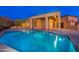 Luxury pool with a waterfall feature and spacious deck; resort-style backyard at 3518 N Shadow Trl, Mesa, AZ 85207