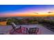 Stunning sunset views from rooftop terrace with seating area at 3518 N Shadow Trl, Mesa, AZ 85207