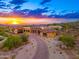 Luxury home nestled on a hillside with scenic sunset views at 3518 N Shadow Trl, Mesa, AZ 85207