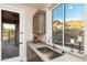 Kitchen with view, stainless steel sink, and wood cabinets at 3518 N Shadow Trl, Mesa, AZ 85207