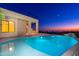 Stunning pool and patio with city views at sunset at 3518 N Shadow Trl, Mesa, AZ 85207