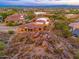 Luxury home with scenic mountain and city views, situated on a rocky hillside at 3518 N Shadow Trl, Mesa, AZ 85207