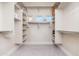 Spacious walk-in closet with custom shelving and hanging space at 3518 N Shadow Trl, Mesa, AZ 85207