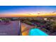 Luxury pool with expansive sunset views and mountain backdrop at 3518 N Shadow Trl, Mesa, AZ 85207