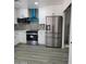 Modern kitchen with stainless steel appliances at 2002 W Adams St, Phoenix, AZ 85009