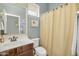 Small bathroom with a shower/tub combo and updated vanity at 6251 S Moccasin Trl, Gilbert, AZ 85298