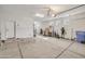 Spacious garage offering abundant storage solutions at 6251 S Moccasin Trl, Gilbert, AZ 85298