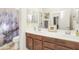 Clean bathroom with double sinks and updated cabinetry at 6251 S Moccasin Trl, Gilbert, AZ 85298